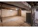 Unfinished basement with exposed utilities, offering potential for customization and storage at 933 N 19Th N St, Elwood, IN 46036