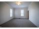 This room has plenty of natural light, fresh paint, and cozy carpeting at 933 N 19Th N St, Elwood, IN 46036