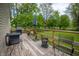 Outdoor patio with chairs and grill perfect for relaxing and entertaining guests at 933 N 19Th N St, Elwood, IN 46036