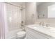 Stylish bathroom featuring a tiled shower, updated vanity, and sleek fixtures at 952 Elm St, Indianapolis, IN 46203