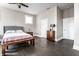 Spacious bedroom with hardwood floors, modern lighting, and neutral decor at 952 Elm St, Indianapolis, IN 46203