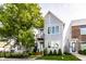 Charming two-story home with a manicured lawn and inviting curb appeal at 952 Elm St, Indianapolis, IN 46203
