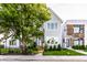 Charming two-story home with a manicured lawn and inviting curb appeal at 952 Elm St, Indianapolis, IN 46203