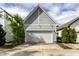 Spacious two car garage with an A-frame roof and a white garage door at 952 Elm St, Indianapolis, IN 46203