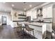 Open kitchen featuring a large island, modern appliances, and stylish decor at 952 Elm St, Indianapolis, IN 46203