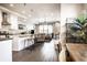 Open concept living area with kitchen, dining area, and comfortable seating at 952 Elm St, Indianapolis, IN 46203