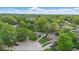 An aerial view of the home's neighborhood featuring mature trees and landscaping at 9526 Burrwood Ct, Indianapolis, IN 46235