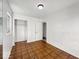 This is a cozy bedroom featuring wood floors and a closet for storage at 9526 Burrwood Ct, Indianapolis, IN 46235