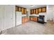 Spacious kitchen with tile flooring, wooden cabinetry and white appliances at 9526 Burrwood Ct, Indianapolis, IN 46235