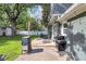 Charming backyard patio with outdoor seating, perfect for entertaining and relaxation at 9860 Sunnymeade Ln, Indianapolis, IN 46280