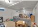 Finished basement with a play area featuring a blue climbing structure at 9860 Sunnymeade Ln, Indianapolis, IN 46280