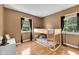 Cozy bedroom with bunk beds, natural light, and hardwood flooring at 9860 Sunnymeade Ln, Indianapolis, IN 46280