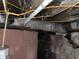 Basement area with a mix of brick and painted walls and exposed pipes at 1014 W 33Rd St, Indianapolis, IN 46208