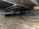 Basement area with exposed pipes and unfinished walls at 1014 W 33Rd St, Indianapolis, IN 46208