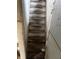 Wooden stairs leading to lower level at 1014 W 33Rd St, Indianapolis, IN 46208
