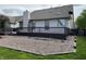 Backyard featuring a large deck area with stone ground cover, great for outdoor entertaining and relaxation at 10305 Lakeland Dr, Fishers, IN 46037