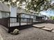 Spacious backyard featuring a large wooden deck and low-maintenance gravel ground cover at 10305 Lakeland Dr, Fishers, IN 46037