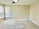 A spacious bedroom with a ceiling fan and neutral walls at 10305 Lakeland Dr, Fishers, IN 46037