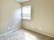 This bedroom offers natural light through a window and soft, neutral tones, enhancing its inviting atmosphere at 10305 Lakeland Dr, Fishers, IN 46037