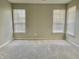 Bright bedroom featuring neutral tones and plenty of natural light, creating a bright and airy atmosphere at 10305 Lakeland Dr, Fishers, IN 46037