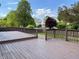 Spacious wooden deck perfect for outdoor entertaining, with backyard views at 10305 Lakeland Dr, Fishers, IN 46037