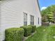 Exterior of the home featuring horizontal siding and well-maintained landscaping at 10305 Lakeland Dr, Fishers, IN 46037