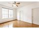 Spacious bedroom with hardwood floors, fan, and ample natural light at 1041 Lincoln Park E Dr, Greenwood, IN 46142