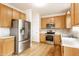 Beautiful kitchen featuring stainless steel appliances and well-crafted wooden cabinets at 1041 Lincoln Park E Dr, Greenwood, IN 46142