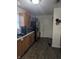 Functional kitchen layout with stainless steel appliances and wooden cabinets, offering practical cooking space at 10425 Candy Apple Ln, Indianapolis, IN 46235
