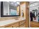 Practical bathroom with a vanity sink, closet, and shower with a curtain at 10456 N State Rd 267, Brownsburg, IN 46112