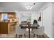 Charming dining area with seating for four and open access to the living room at 10456 N State Rd 267, Brownsburg, IN 46112