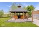 Outdoor gazebo boasts a bar, built-in grill, and a concrete patio surrounded by decorative gravel at 10456 N State Rd 267, Brownsburg, IN 46112