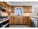 Well-lit kitchen featuring modern appliances, ample counter space, and a view from the window at 10456 N State Rd 267, Brownsburg, IN 46112