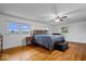 Bright main bedroom with hardwood floors, generous windows, and ample space at 10456 N State Rd 267, Brownsburg, IN 46112