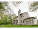 Charming two-story home with a well-maintained lawn, attached garage, and a spacious backyard at 12253 Bedrock Ct, Fishers, IN 46037