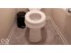 Close up view of toilet and waste basket at 12253 Bedrock Ct, Fishers, IN 46037