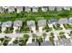 Aerial view of a residential neighborhood with well-maintained houses, mature trees, and manicured lawns at 12722 Moonseed Dr, Carmel, IN 46032