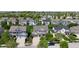 An aerial view of a neighborhood showcases the well-maintained lawns and various home styles at 12722 Moonseed Dr, Carmel, IN 46032