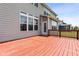 Stunning back deck features access to the home and provides views of the backyard and neighborhood at 12722 Moonseed Dr, Carmel, IN 46032