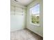 Walk in closet with wire shelving and a window providing natural light at 12722 Moonseed Dr, Carmel, IN 46032