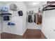Spacious walk-in closet with shelving and ample storage for clothing and accessories at 12722 Moonseed Dr, Carmel, IN 46032
