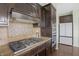 Kitchen with granite countertops and stainless steel appliances at 12722 Moonseed Dr, Carmel, IN 46032