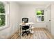Bright office space with hardwood floors, natural light, and a modern desk setup at 1337 N Concord St, Indianapolis, IN 46222