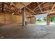 Interior of a barn featuring an open layout with concrete floors at 13765 Howe Rd, Fishers, IN 46038