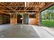 Interior of a barn featuring an open layout with concrete floors and horse stalls at 13765 Howe Rd, Fishers, IN 46038