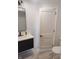 Modern bathroom with sleek vanity, matte black fixtures, and minimalist design for a spa-like feel at 1527 N C N St, Elwood, IN 46036