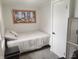 This charming bedroom features a comfortable twin bed and stylish decor for a cozy retreat at 1527 N C N St, Elwood, IN 46036