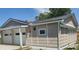 Detached garage with white door and siding matching the main house at 1527 N C N St, Elwood, IN 46036