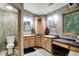 Bathroom with double vanity, granite countertop, and custom cabinets at 1530 E 75Th St, Indianapolis, IN 46240