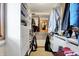 Walk-in closet with built-in shelving and drawers for optimal organization at 1530 E 75Th St, Indianapolis, IN 46240